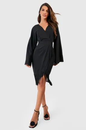 Tassel Hem Wrap Mini Dress